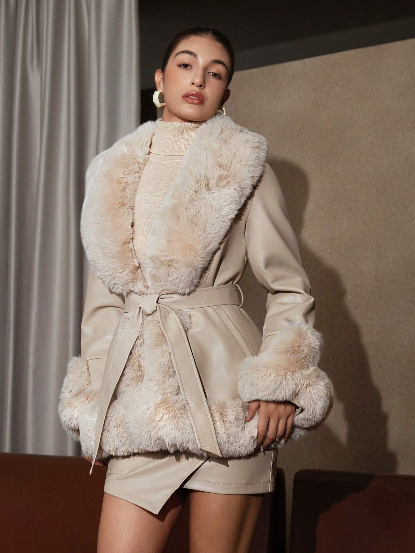 Winter coat with water-repellent hood made of faux bond material 4