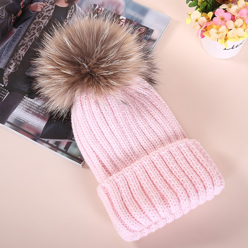 Knitted hat with faux fox fur pompom for cold winter days 1